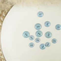 Bouton brillant polyester Bleu ciel