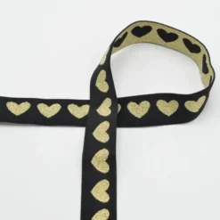 Elastique Lurex motif coeurs Doré fond noir 25mm