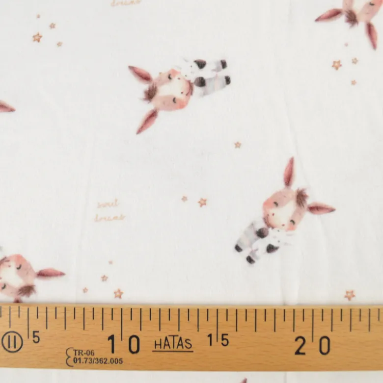 Flanelle motif ânes et étoiles fond blanc cassé