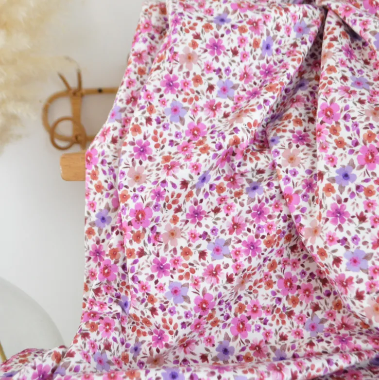 Jersey fleurs fuchsia et parme fond blanc cassé – Poppy Fabrics - OEKO TEX