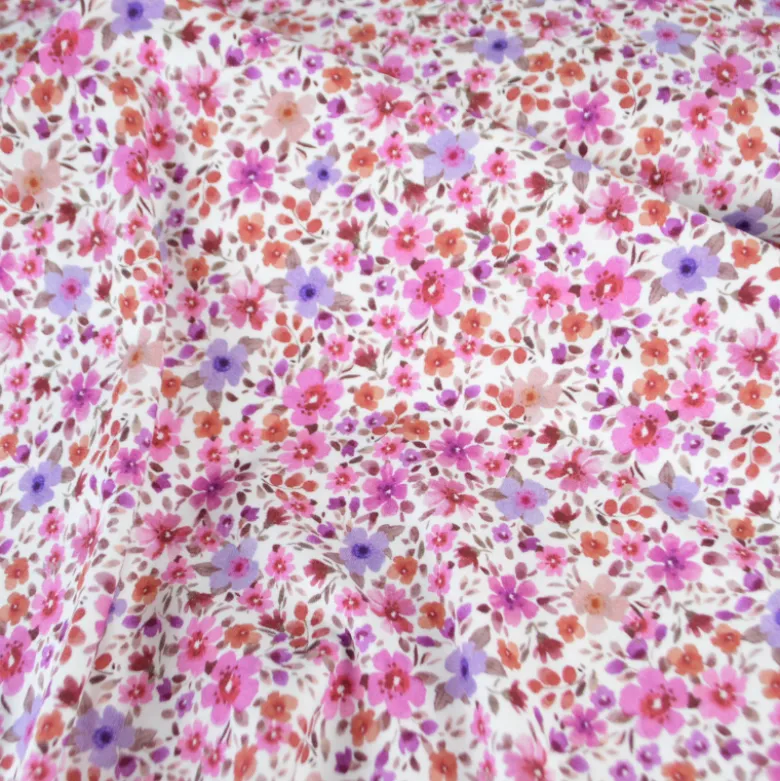 Jersey fleurs fuchsia et parme fond blanc cassé – Poppy Fabrics - OEKO TEX