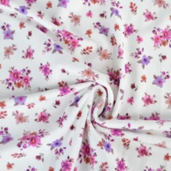 Jersey fleurs Léa fuchsia et parme fond blanc cassé – Poppy Fabrics - OEKO TEX