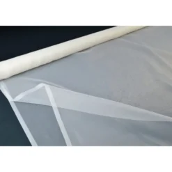 Organzaivoire 100% polyester 300cm .
