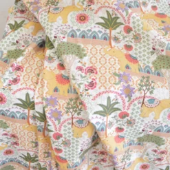 Popeline de coton Goa motif éléphants et fleurs fond blanc