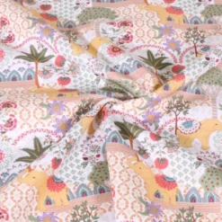 Popeline de coton Goa motif éléphants et fleurs fond blanc