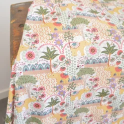 Popeline de coton Goa motif éléphants et fleurs fond blanc