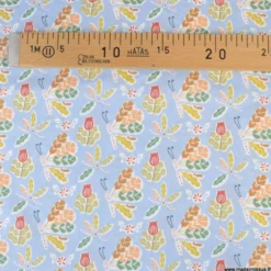 Popeline Issoria motif fleurs fond bleu - OEKO TEX