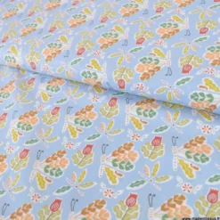 Popeline Issoria motif fleurs fond bleu - OEKO TEX
