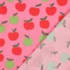 Popeline Poppy motif Pommes rouges et vertes fond rose