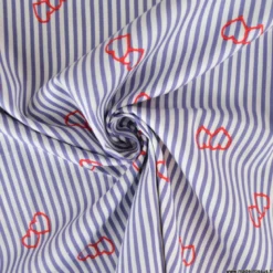 Popeline stretch à rayures motif coeurs