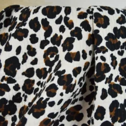 Seersucker surpiqué motif léopard sable et noir
