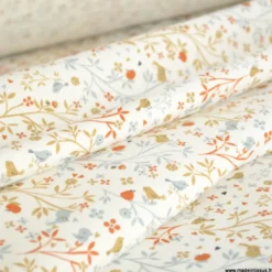 Sergé de coton Camilia motif fleurs, oiseaux et fruits fond blanc