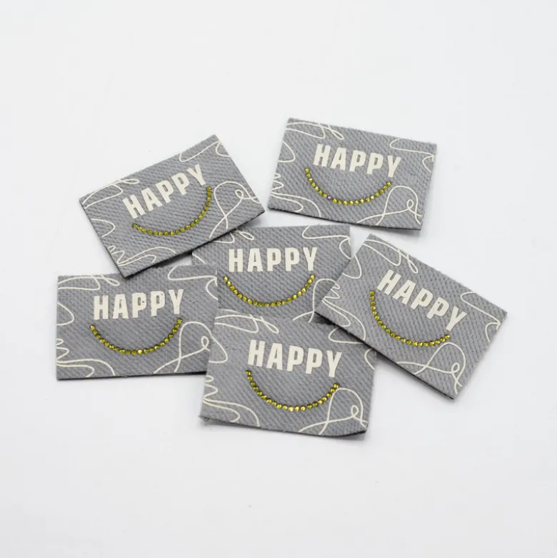 Étiquette tissée gris - Happy - strass doré