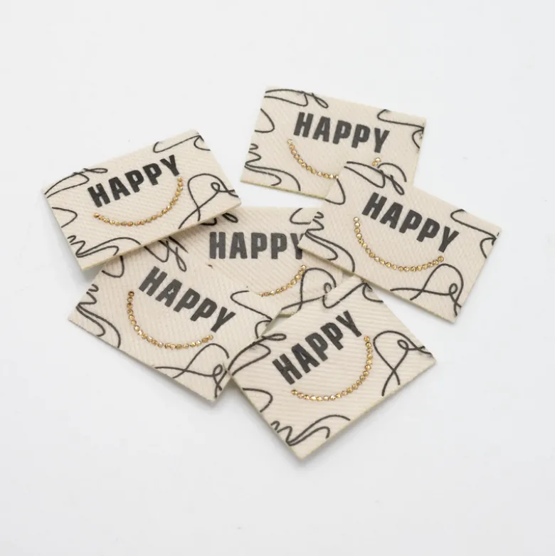 Étiquette tissée - Happy - strass doré