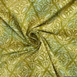 Tissu Batik fond motif rosaces fond vert