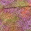Tissu Batik fond motifs fleuris violet, vert et orange