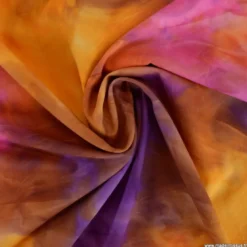 Tissu Batik marbré orange et violet