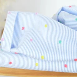 Tissu chambray à rayures plumetis bleu ciel