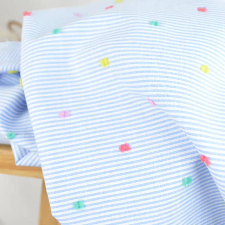 Tissu chambray à rayures plumetis bleu ciel
