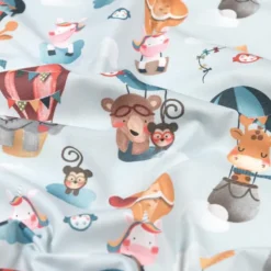 Tissu coton Baby motif animaux et montgolfières fond ciel - OEKO TEX