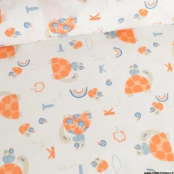 Tissu Coton Bekitou motif Tortues oranges fond blanc - OEKO TEX