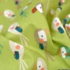 Tissu coton Bio Djikene motifs Toucans fond guacamole -OEKO TEX