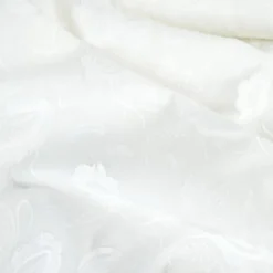 Tissu coton brodé blanc cassé à fleurs frangées