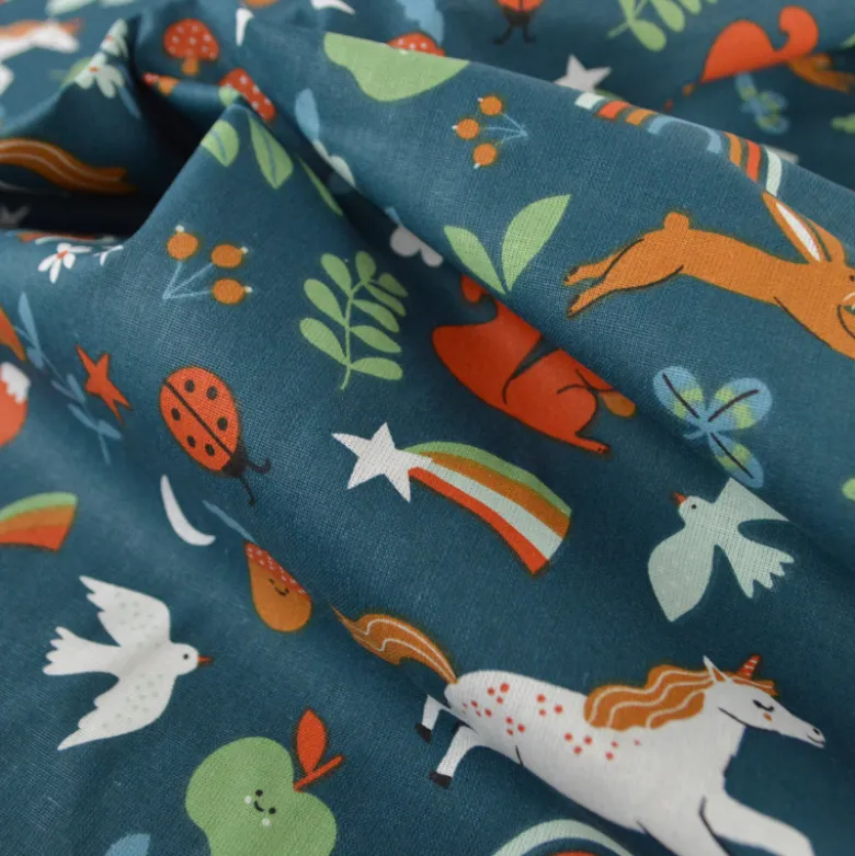 Tissu coton Cassiopée - Motif animaux et licornes fond pétrole