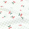 Tissu coton Cherries motif cerises fond vichy vert