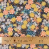 Tissu coton Enduit Akemi motifs fleurs fond marine