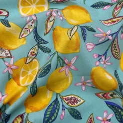 Tissu coton enduit citronnier fond turquoise