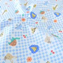Tissu coton Enduit Joe motif carreaux bleus et blanc et animaux