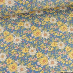 Tissu coton Enduit Lolita motifs fleurs fond marine