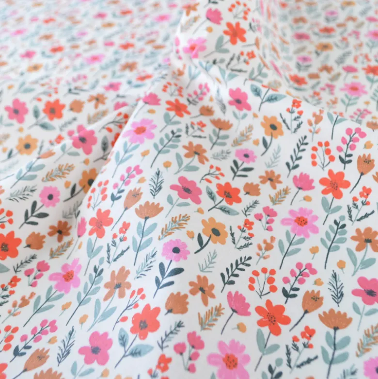 Tissu coton Enduit Maddy fleurs roses fond écru