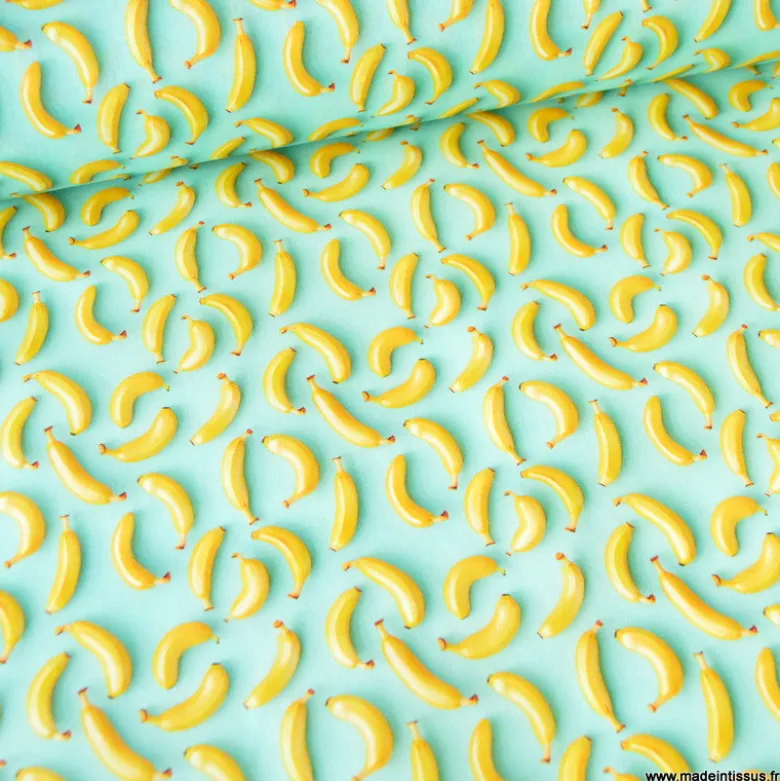 Tissu coton enduit motif bananes 3D – Fond vert menthe