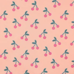 Tissu coton Enduit motifs cerises fond rose