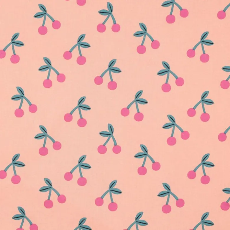 Tissu coton Enduit motifs cerises fond rose