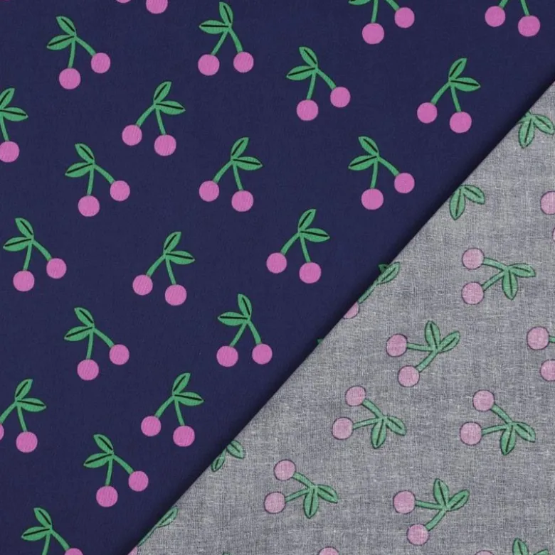 Tissu coton Enduit motifs cerises fond bleu marine