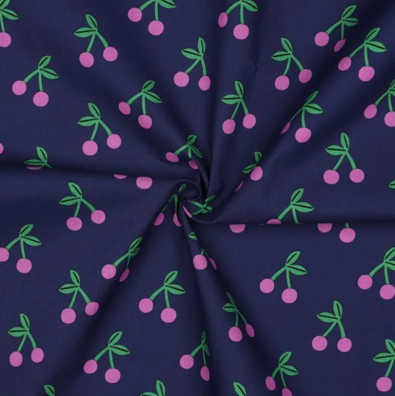Tissu coton Enduit motifs cerises fond bleu marine