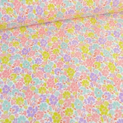 Tissu coton enduit petites fleurs roses et parme fond blanc - Poppy