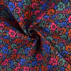 Tissu coton enduit petites fleurs vintage bleues et rouge - Poppy