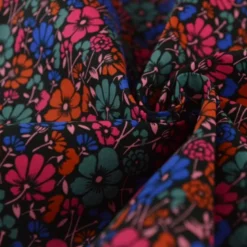 Tissu coton enduit petites fleurs vintage bleues et rouge - Poppy