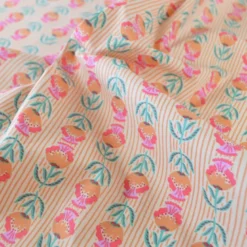 Tissu coton Enduit Surie motif fleurs indiennes vert et rose