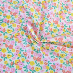 Tissu coton Enduit Thalie motif fleurs roses et jaunes
