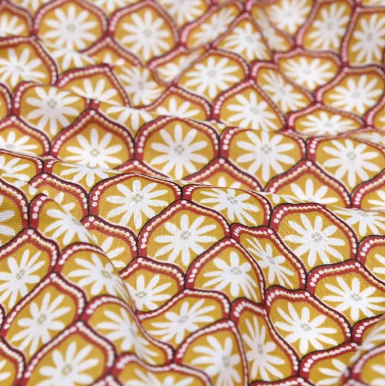 Tissu coton Enduit Zea motif fleurs graphique jaune