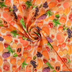 Tissu coton fruits exotiques 3D – Mangue, papaye & agrumes sur fond orange