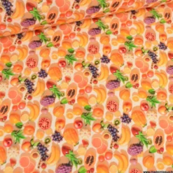 Tissu coton fruits exotiques 3D – Mangue, papaye & agrumes sur fond orange
