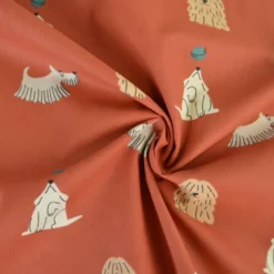 Tissu coton imprimé chiens fond terracotta - OEKO TEX