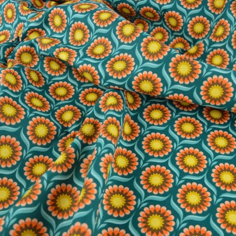 Tissu coton Jolijoli motif fleurs fond turquoise - OEKO TEX