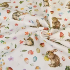 Tissu coton lapins et oeufs de Pâques fond blanc